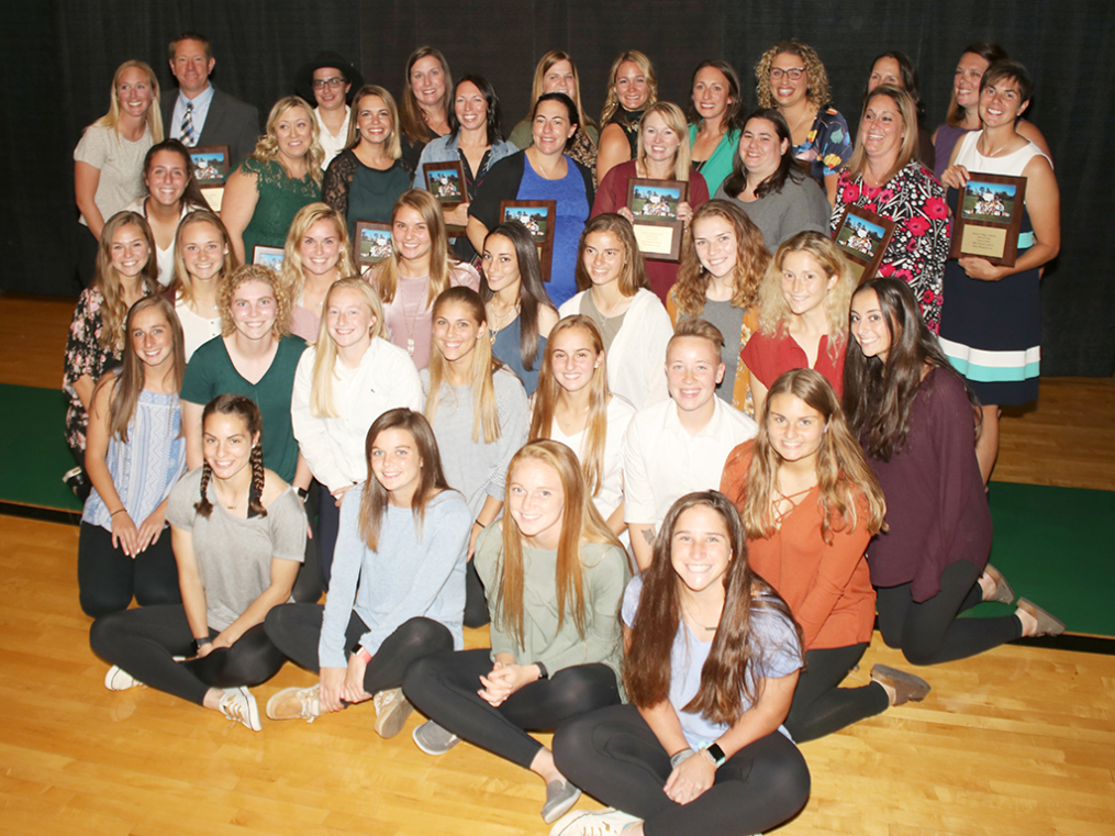 The newly inducted 2001 Women's Soccer team poses with members of the current Women's Soccer team at the Dr. Arthur F. Kirk, Jr. Athletics Hall of Fame Induction & Dinner Friday night.